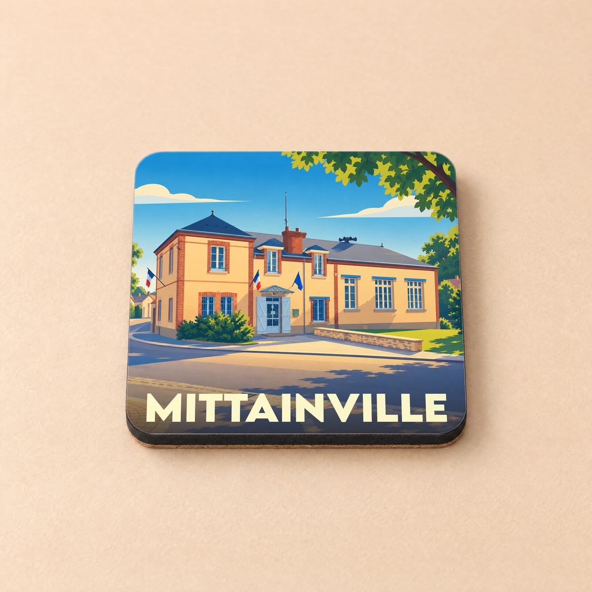 Dessous de verre souvenir de la ville de Mittainville avec une illustration stylisée de sa mairie.