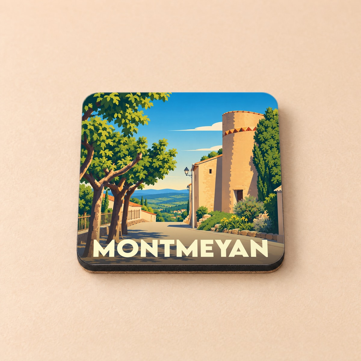 Dessous de verre souvenir de la ville de Montmeyan avec une illustration stylisée.
