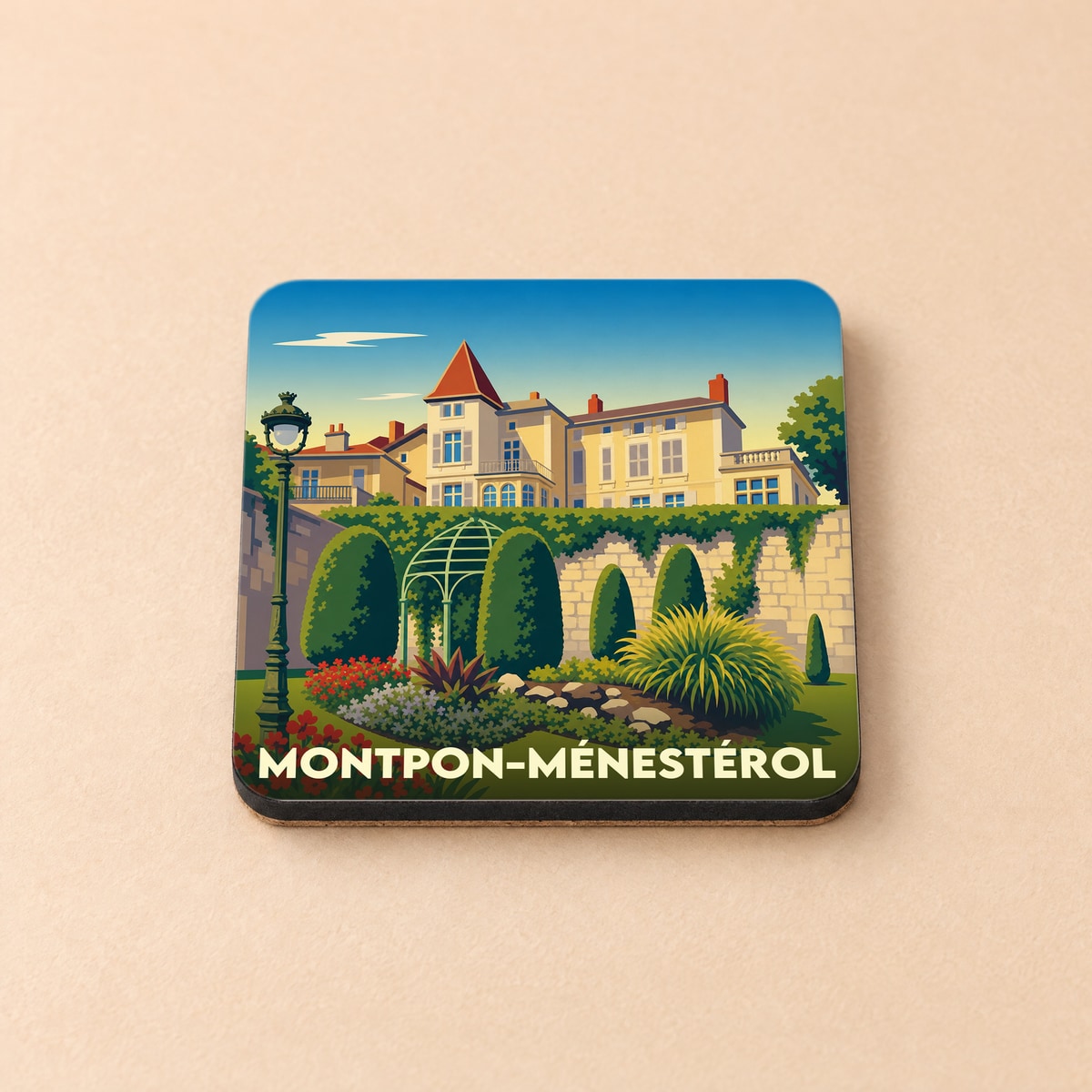Dessous de verre souvenir de la ville de Montpon-Ménestérol avec une illustration stylisée.