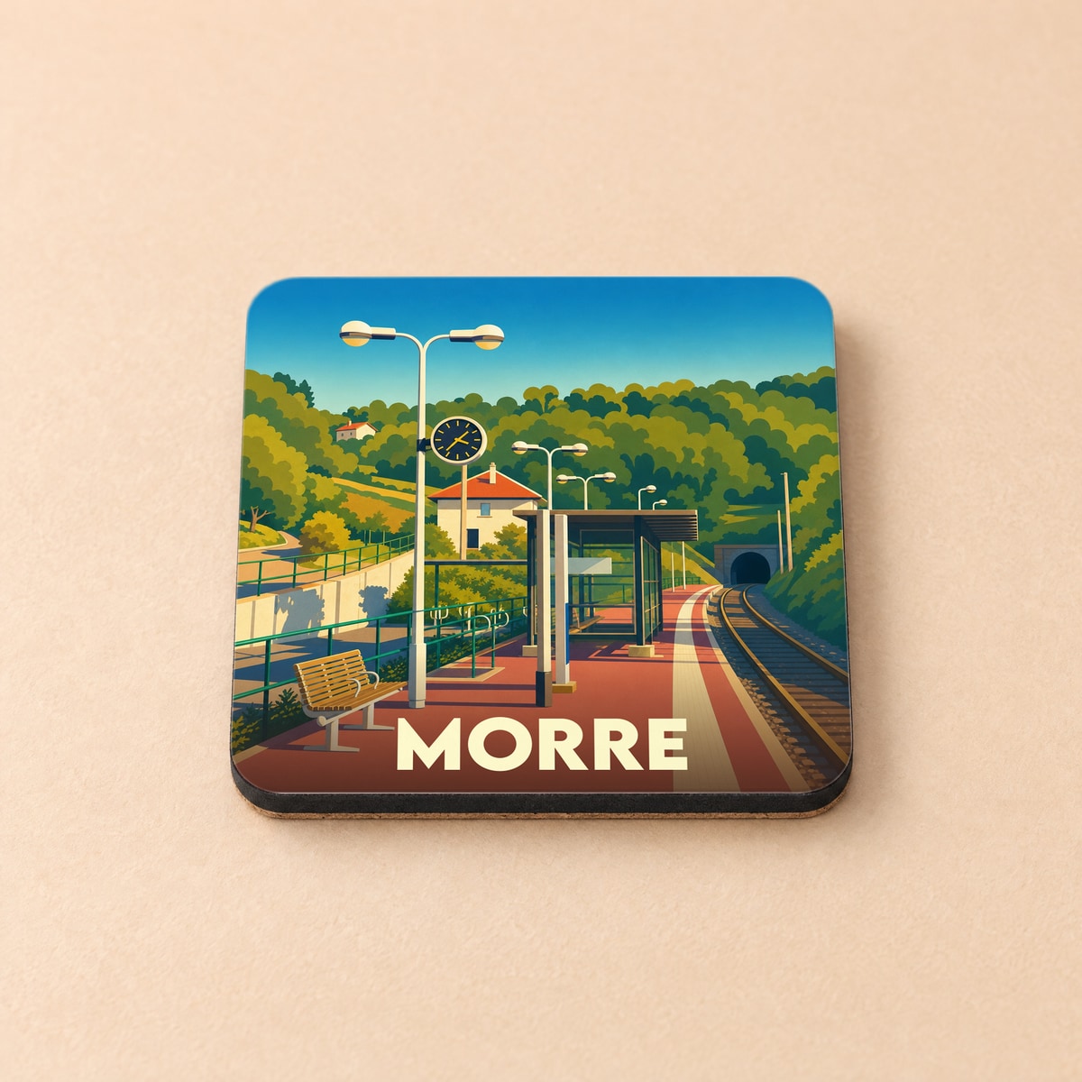 Dessous de verre souvenir de la ville de Morre avec une illustration stylisée de sa gare ferroviaire.
