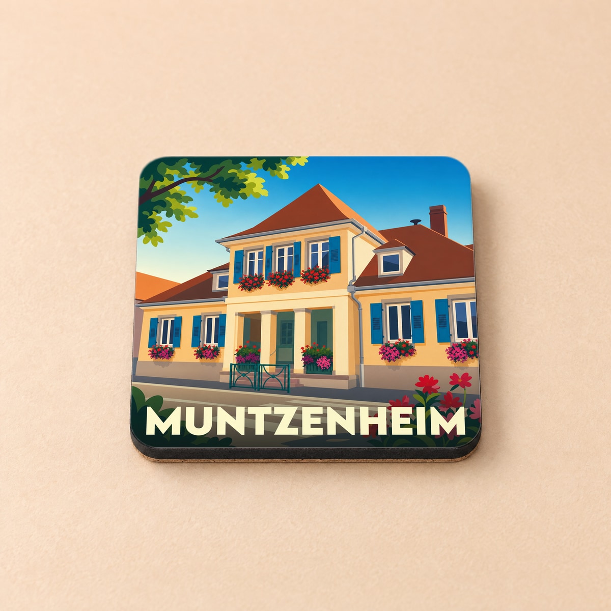 Dessous de verre souvenir de la ville de Muntzenheim avec une illustration stylisée d'une maison traditionnelle.