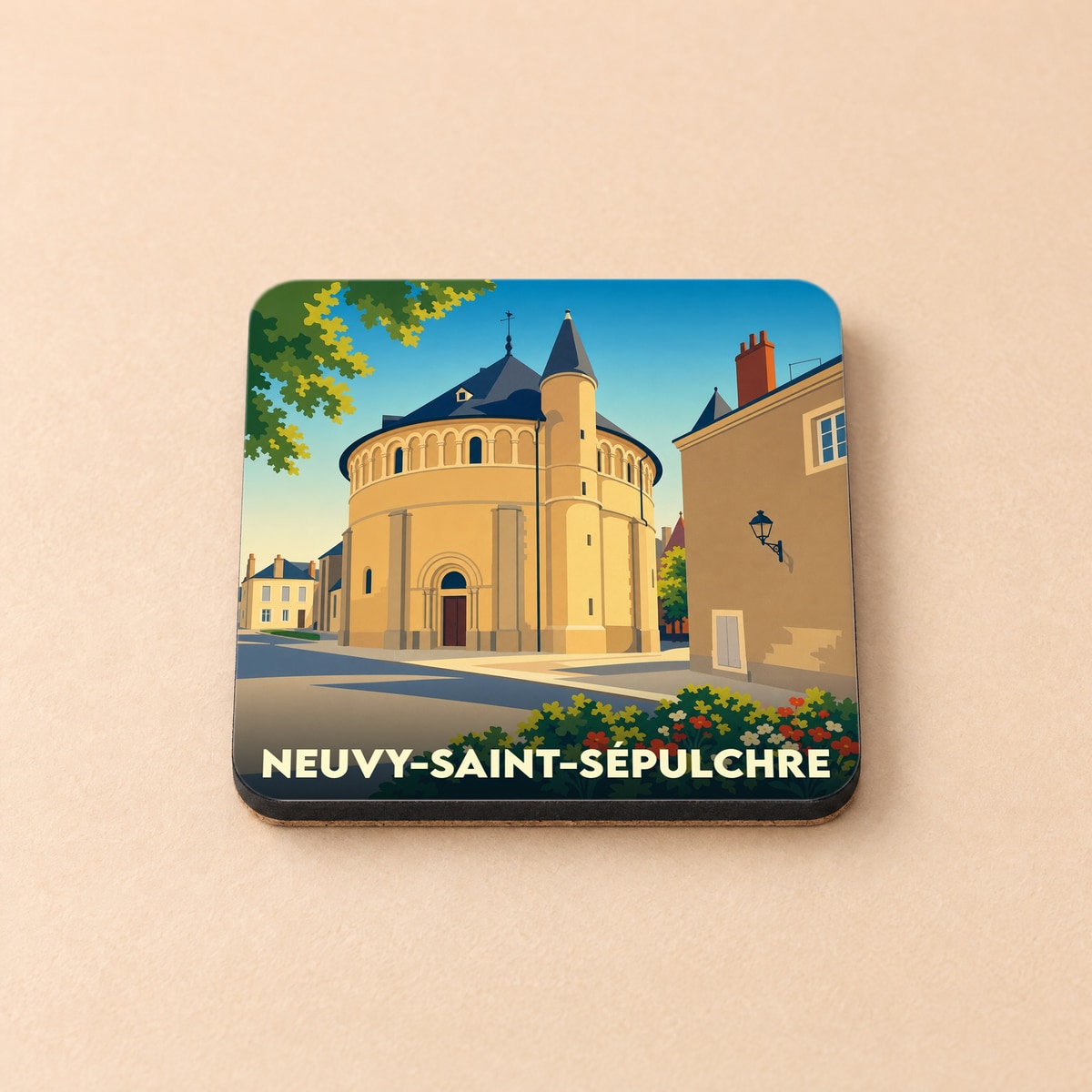 Dessous de verre souvenir de la ville de Neuvy-Saint-Sépulchre avec une illustration stylisée de son église circulaire.