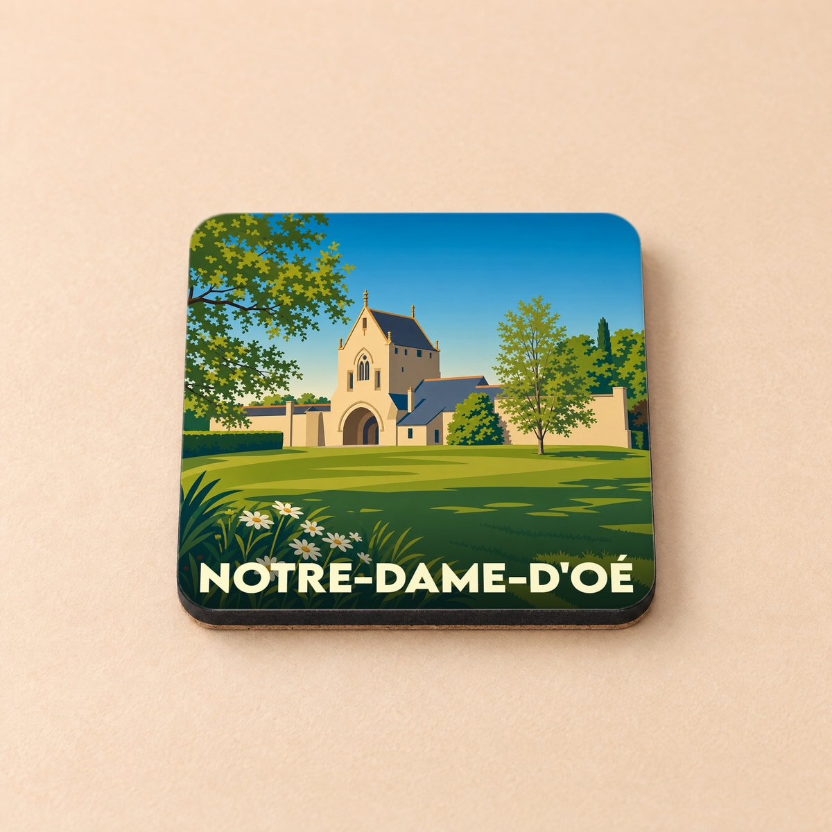 Dessous de verre souvenir de la ville de Notre-Dame-d'Oé avec une illustration stylisée.