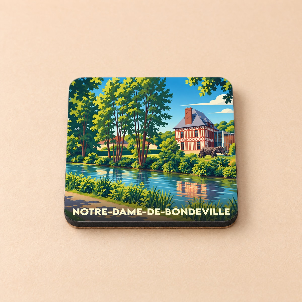 Dessous de verre souvenir de la ville de Notre-Dame-de-Bondeville avec une illustration stylisée d'un manoir normand en bord de rivière.