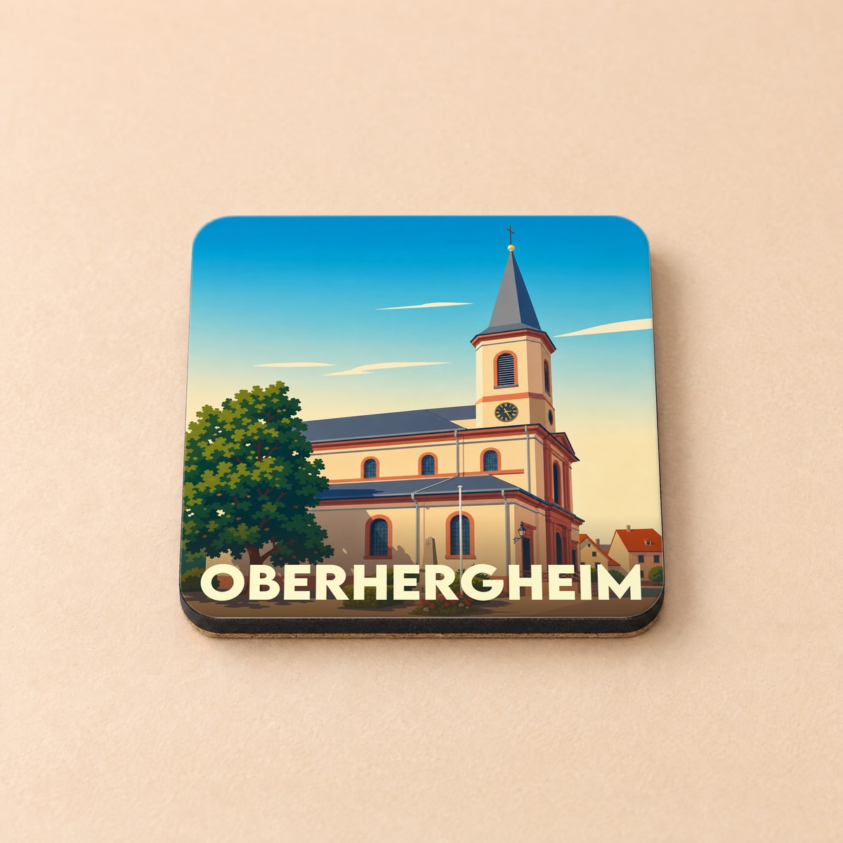 Dessous de verre souvenir de la ville d'Oberhergheim illustré par une église stylisée sous un ciel bleu.