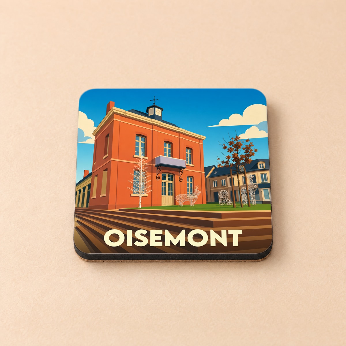 Dessous de verre souvenir de la ville de Oisemont avec une illustration stylisée de son hôtel de ville.