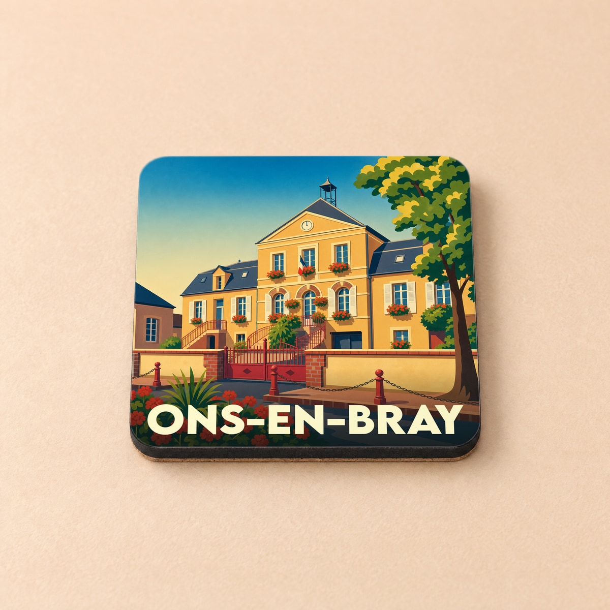 Dessous de verre souvenir de la ville de Ons-en-Bray avec une illustration stylisée de sa mairie.