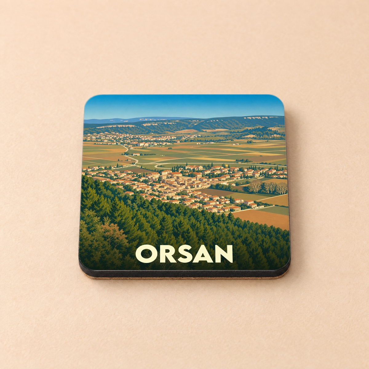 Dessous de verre souvenir de la ville de Orsan avec une illustration stylisée d'un paysage panoramique.