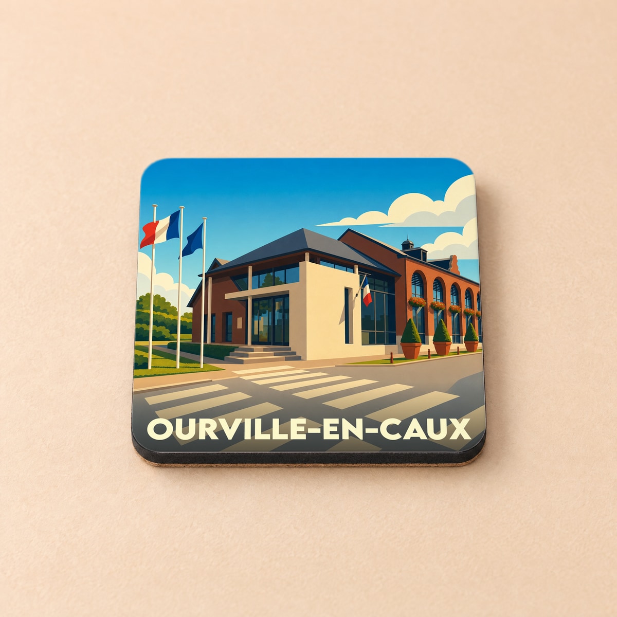 Dessous de verre souvenir de la ville de Ourville-en-Caux avec une illustration stylisée de sa mairie.
