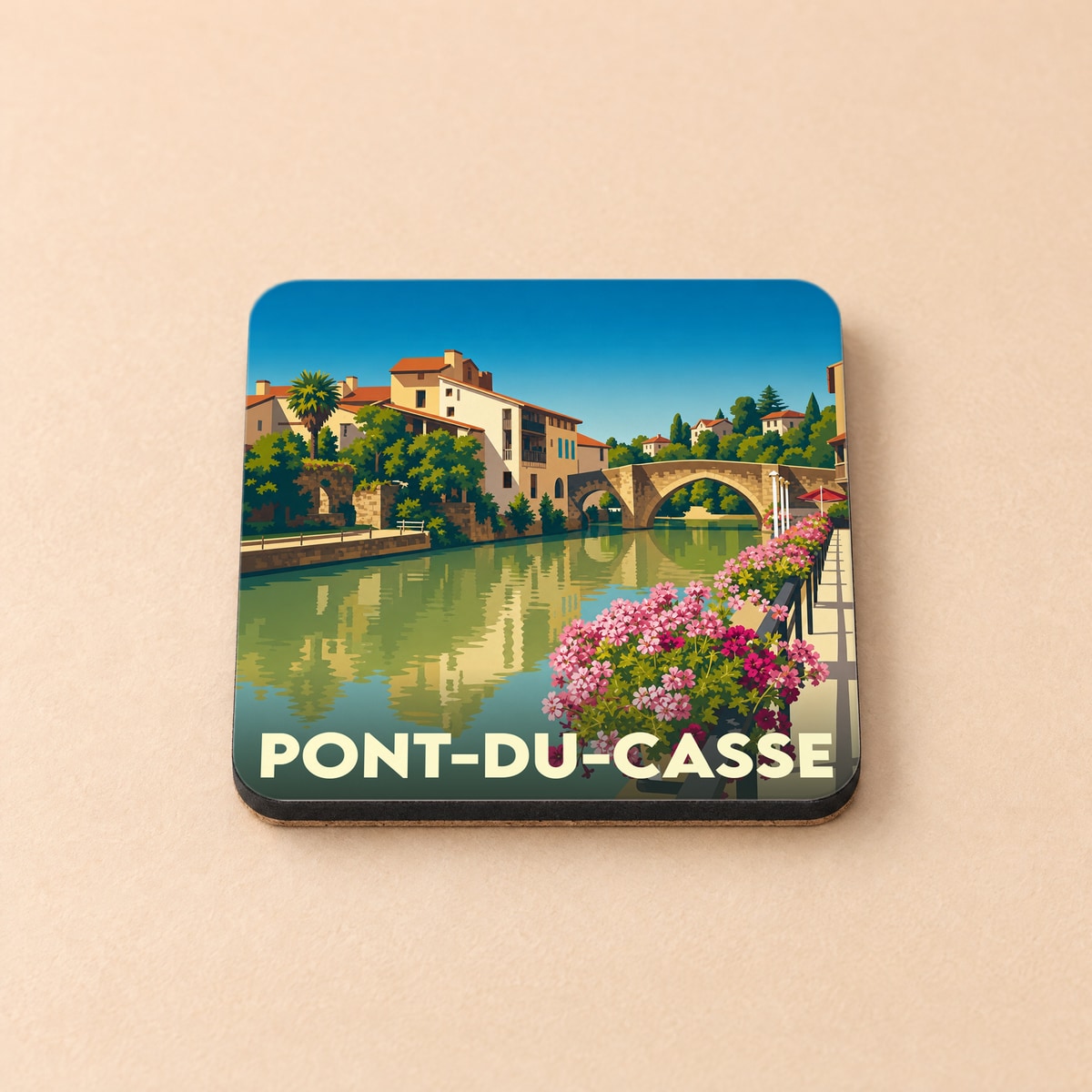Dessous de verre souvenir de la ville de Pont-du-Casse avec une illustration stylisée.