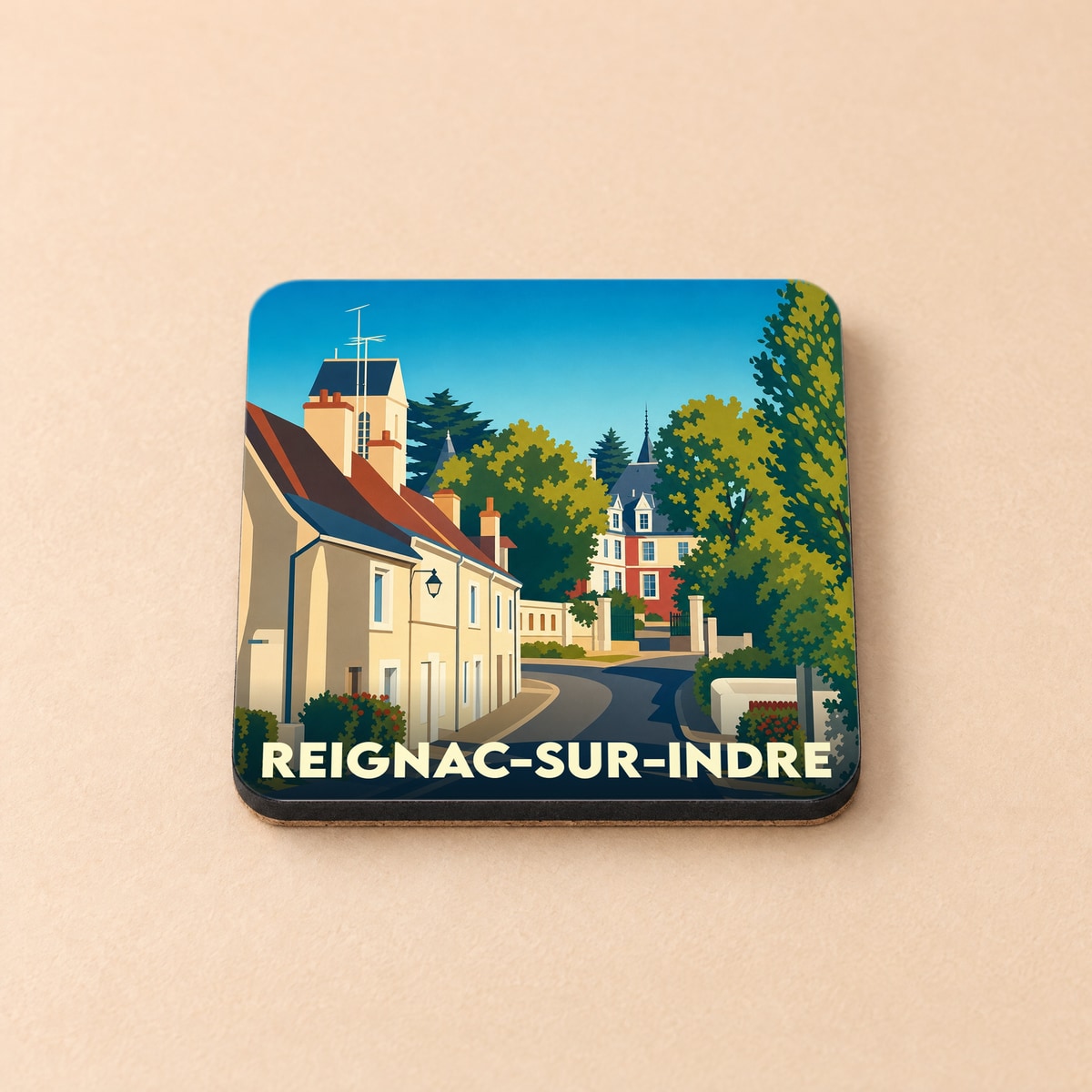 Dessous de verre souvenir de la ville de Reignac-sur-Indre avec une illustration stylisée.