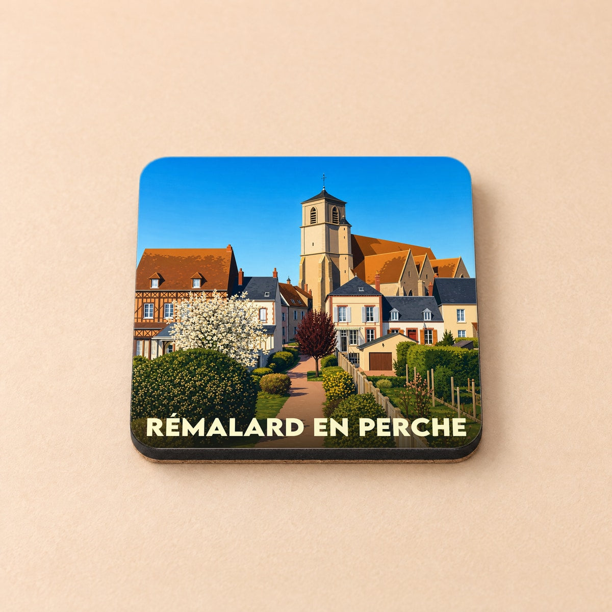 Dessous de verre souvenir de la ville de Rémalard en Perche avec une illustration stylisée.