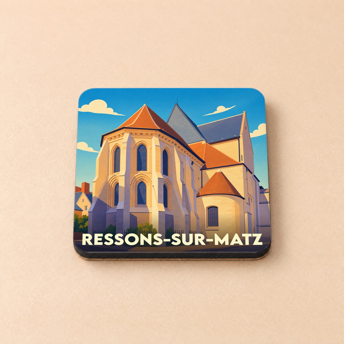 Dessous de verre souvenir de la ville de Ressons-sur-Matz avec une illustration stylisée de son église.