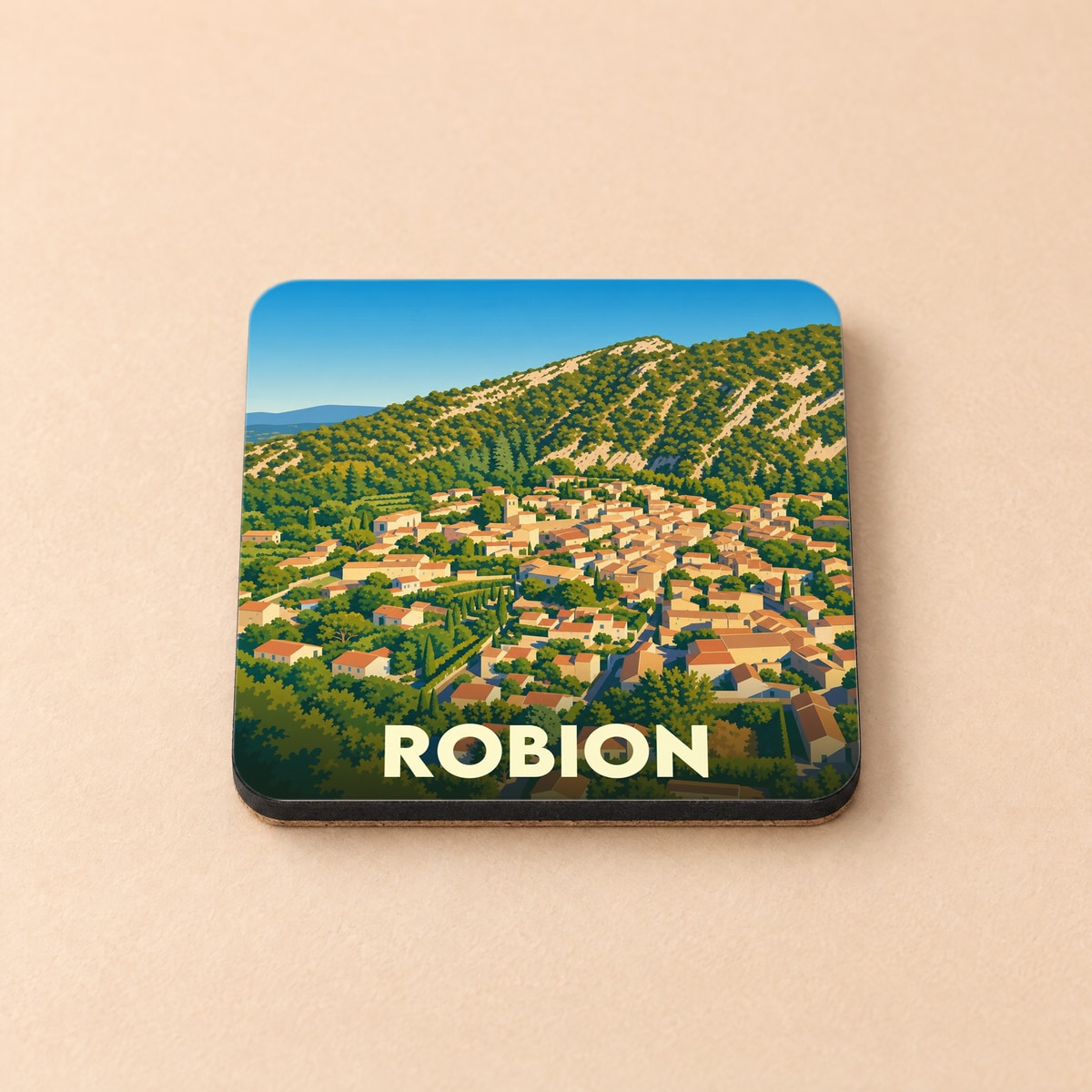 Dessous de verre souvenir de la ville de Robion avec une illustration stylisée.