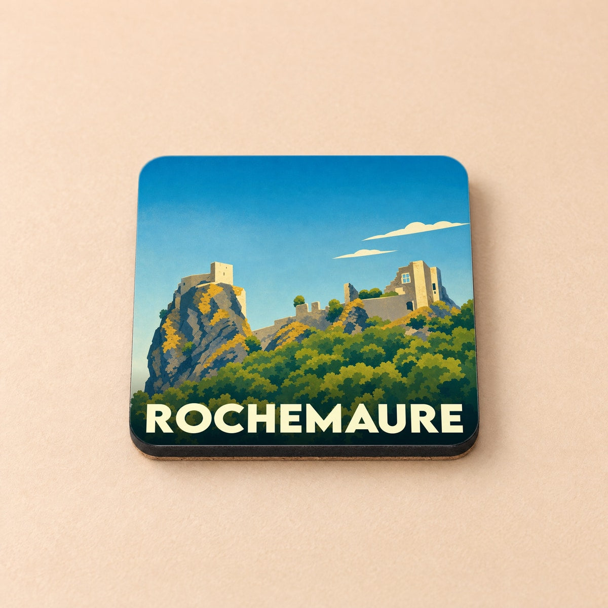 Dessous de verre souvenir de la ville de Rochemaure avec une illustration stylisée du château sur son rocher.