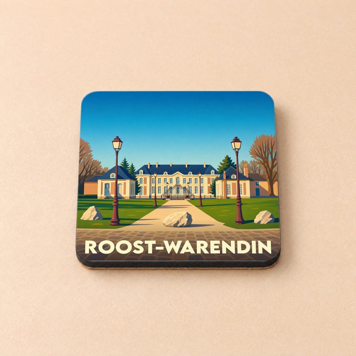 Dessous de verre souvenir de la ville de Roost-Warendin avec une illustration stylisée de son château.