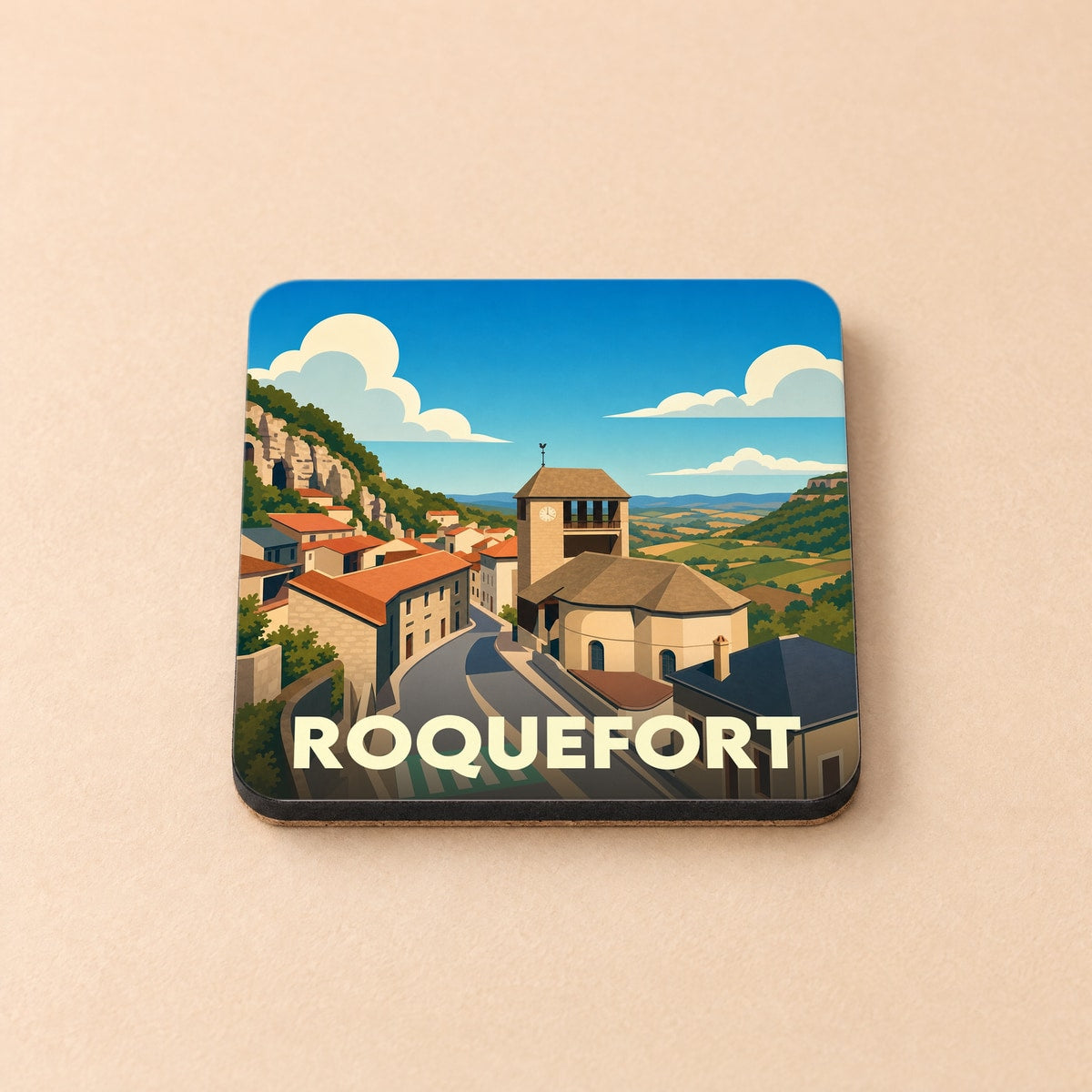 Dessous de verre souvenir de la ville de Roquefort avec une illustration stylisée.