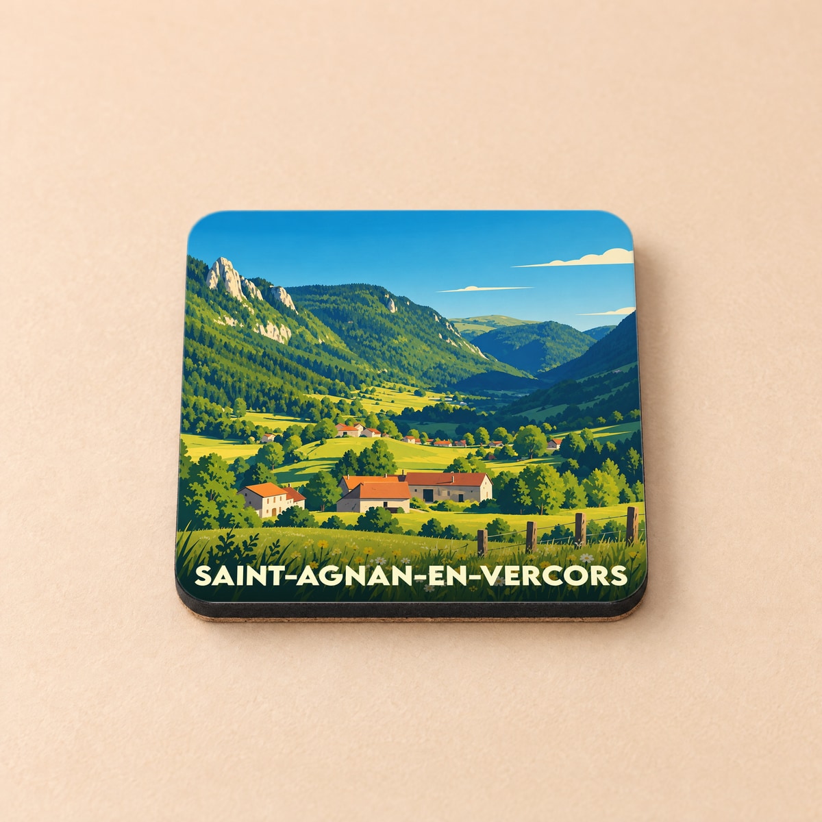 Dessous de verre souvenir de la ville de Saint-Agnan-en-Vercors illustré d'un paysage montagneux stylisé.