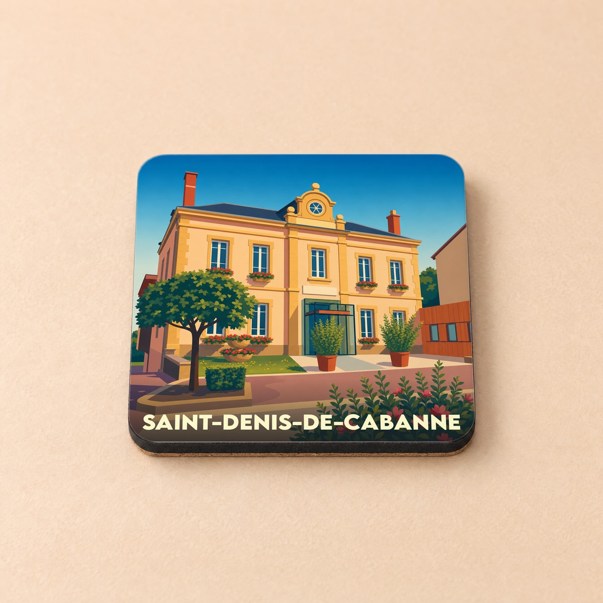 Dessous de verre souvenir de Saint-Denis-de-Cabanne illustré d'un bâtiment municipal stylisé et coloré.