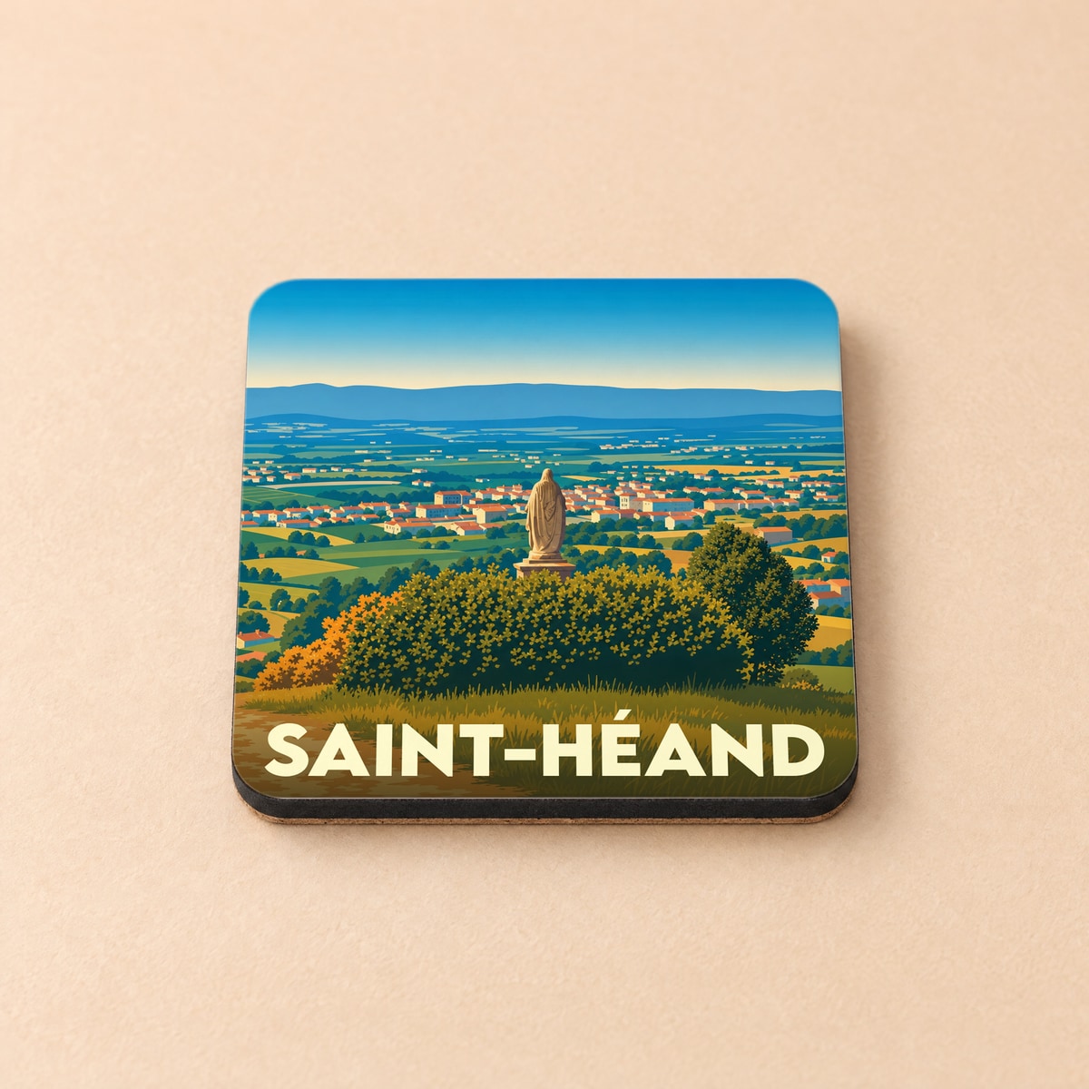 Dessous de verre souvenir de la ville de Saint-Héand avec une illustration stylisée.