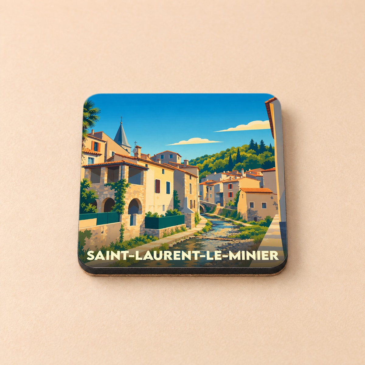 Dessous de verre souvenir de la ville de Saint-Laurent-le-Minier avec une illustration stylisée.