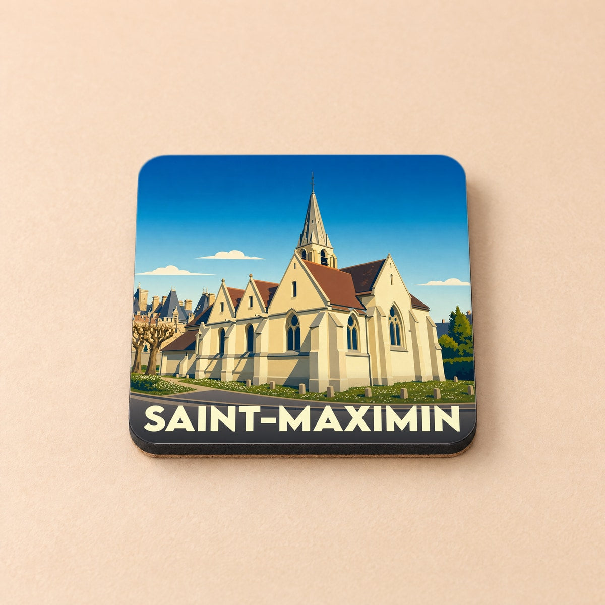 Dessous de verre souvenir de la ville de Saint-Maximin illustré d'une église de style gothique.