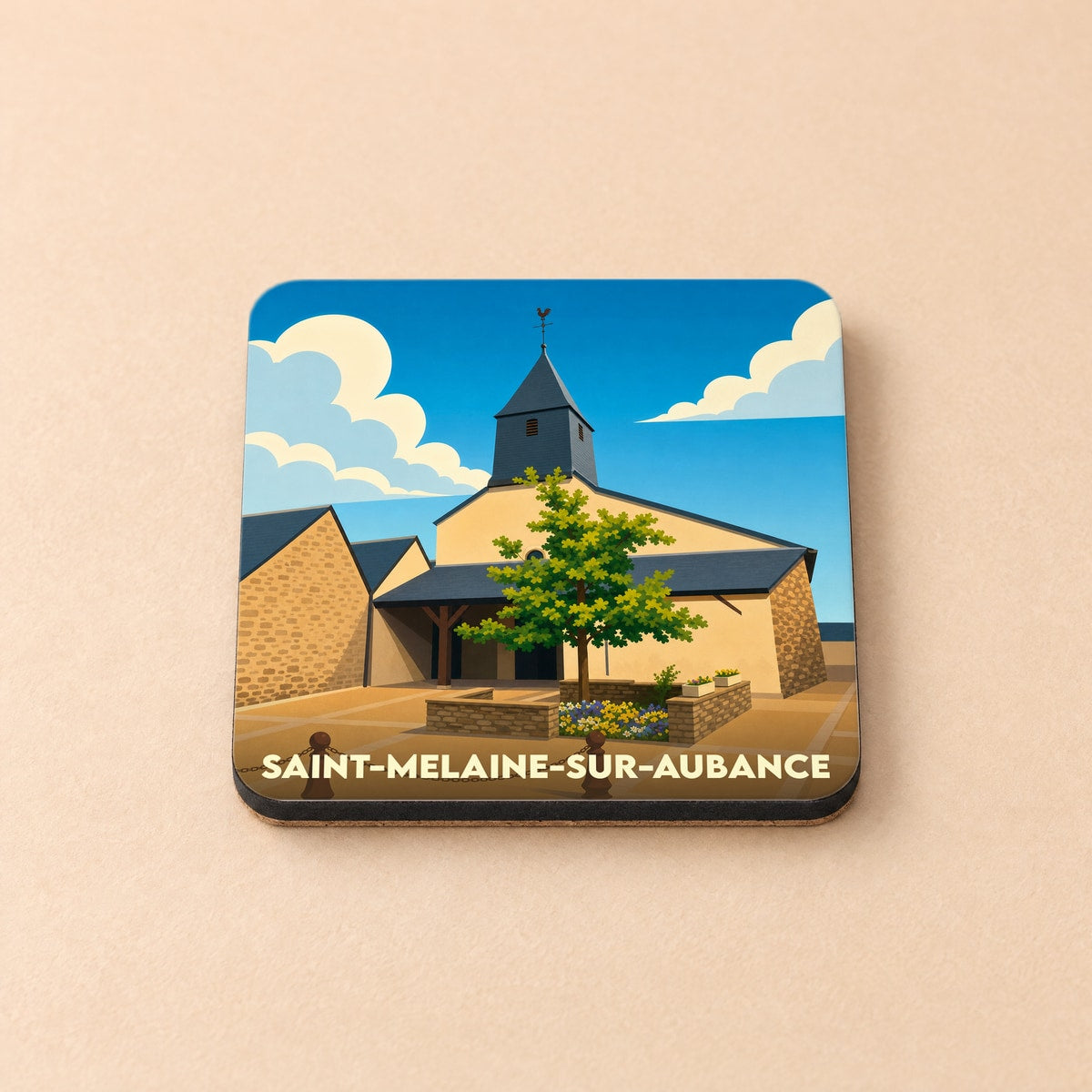 Dessous de verre souvenir de la ville de Saint-Melaine-sur-Aubance avec une illustration stylisée de son église.