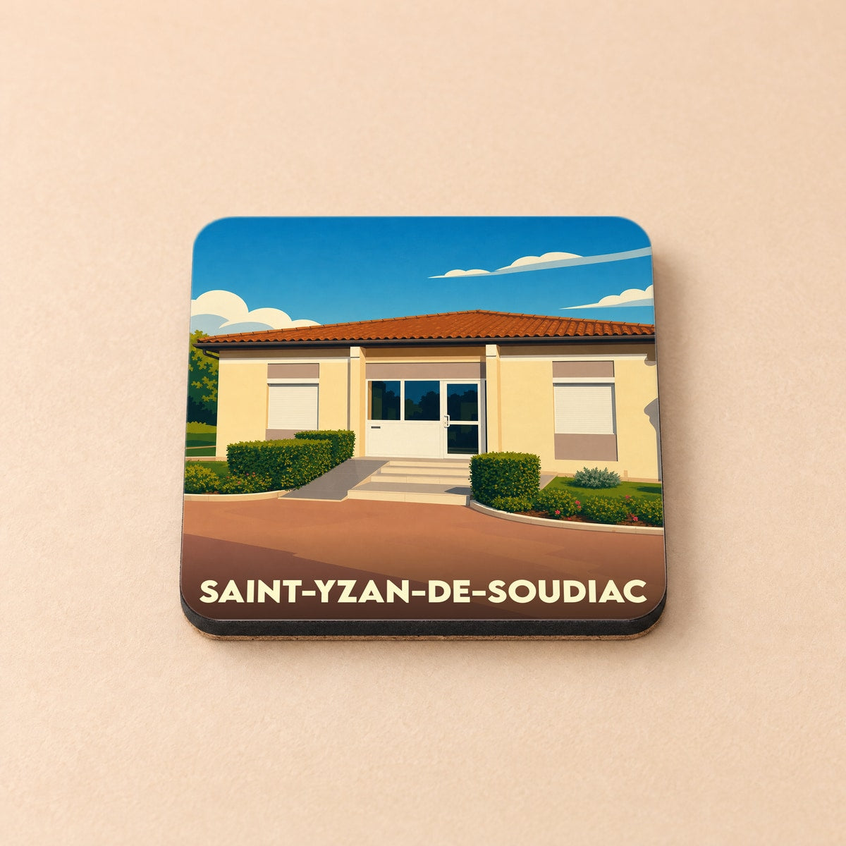 Dessous de verre souvenir de la ville de Saint-Yzan-de-Soudiac avec une illustration stylisée.