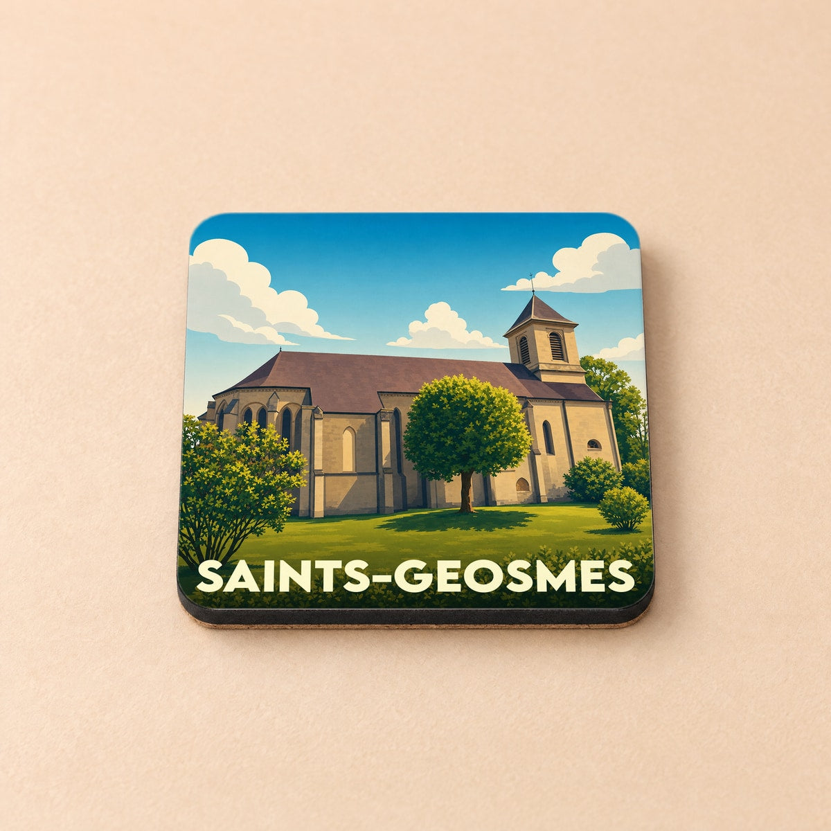 Dessous de verre souvenir de la ville de Saints-Geosmes avec une illustration stylisée de son église.