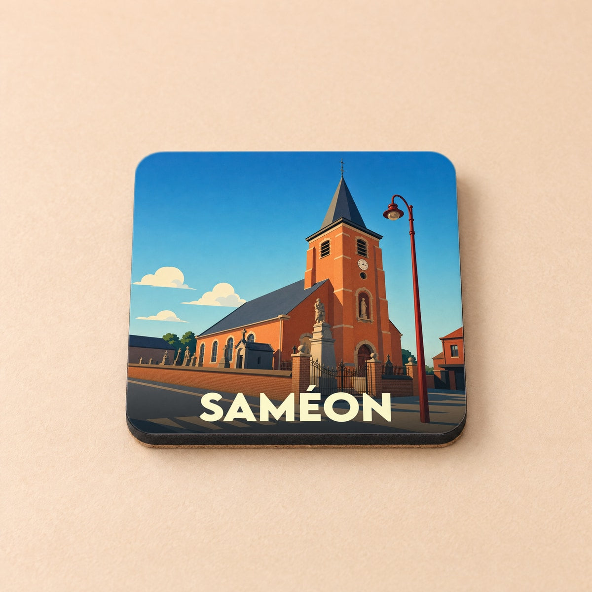 Dessous de verre souvenir de la ville de Saméon avec une illustration stylisée de son église.