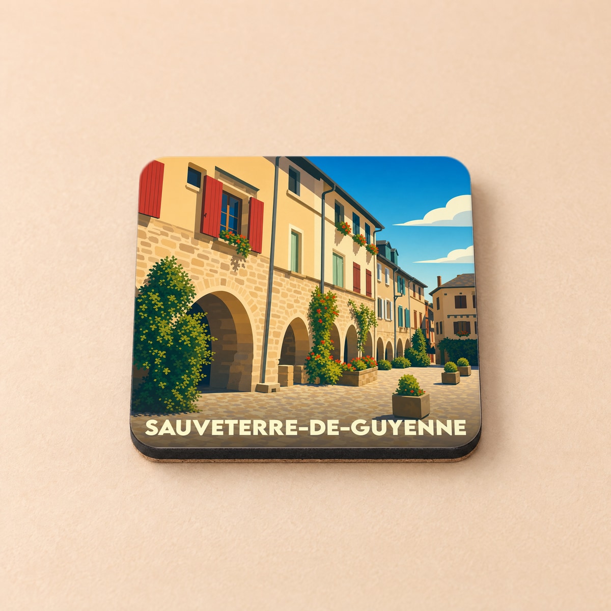 Dessous de verre souvenir de Sauveterre-de-Guyenne illustré par une scène de rue aux arcades médiévales.
