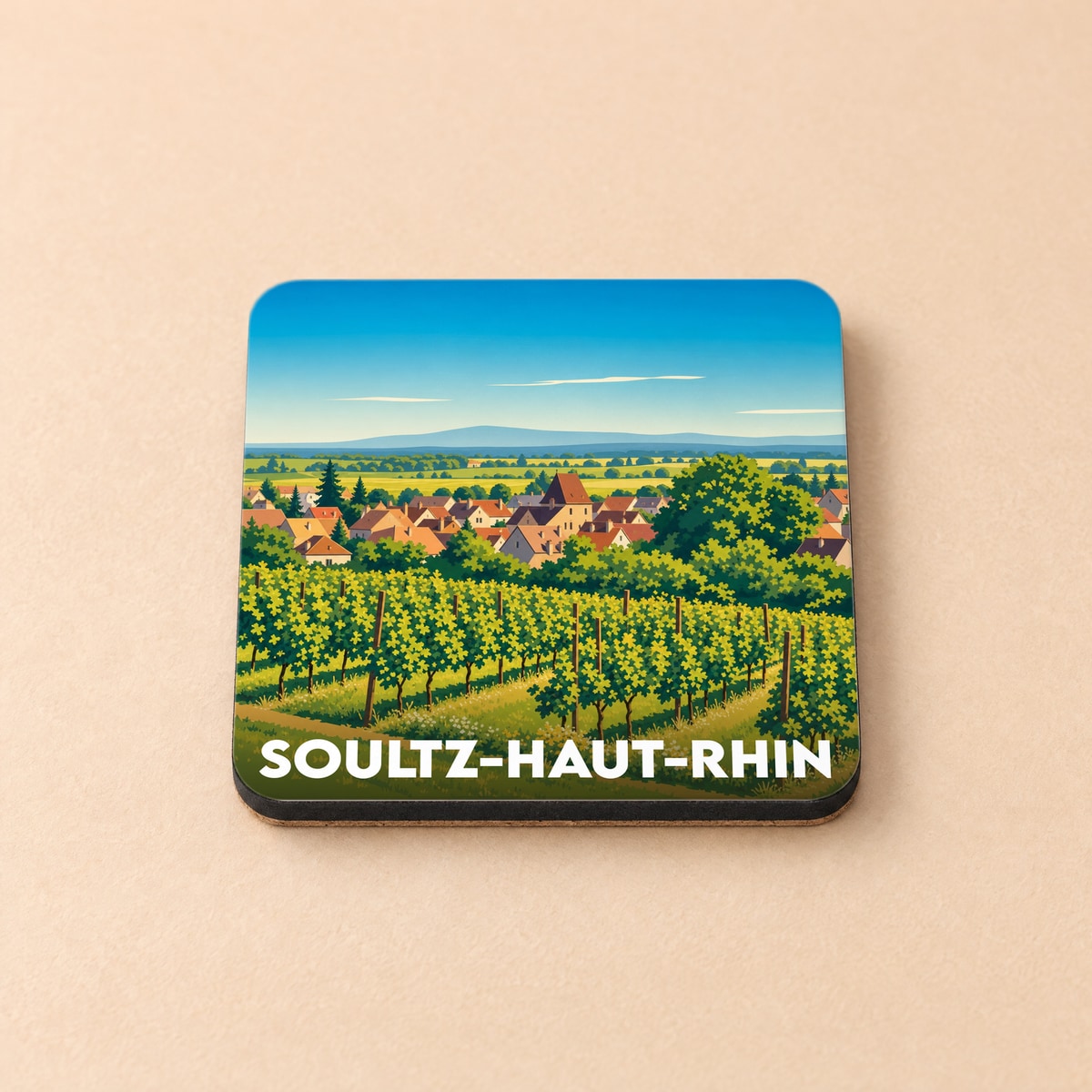 Dessous de verre souvenir de la ville de Soultz-Haut-Rhin avec une illustration stylisée de ses vignobles et son village.
