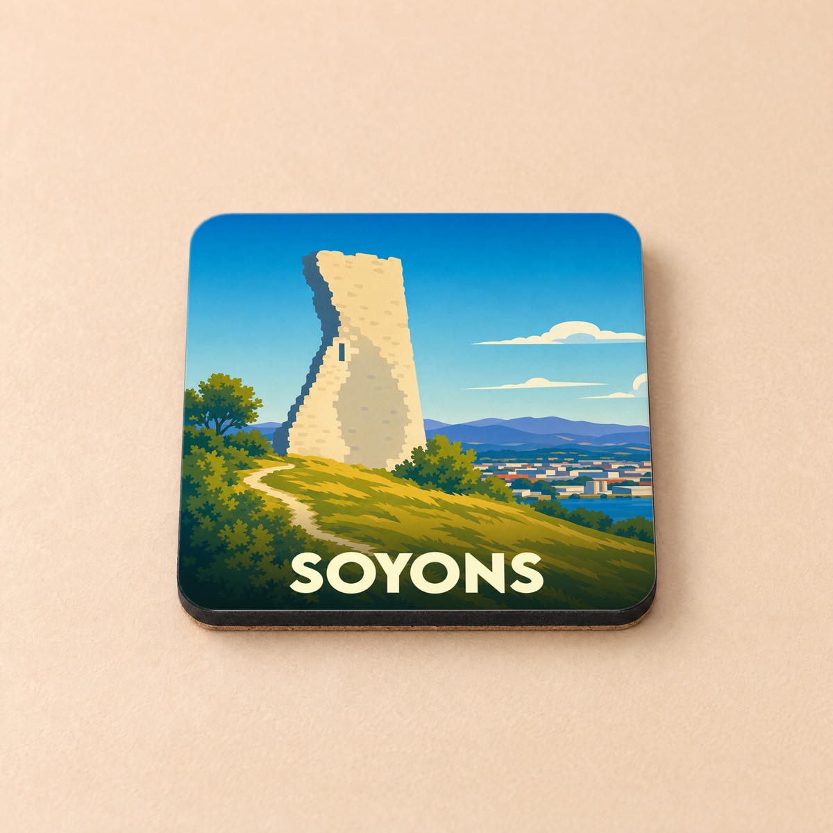 Dessous de verre souvenir de la ville de Soyons illustrant la tour penchée dominant le Rhône.