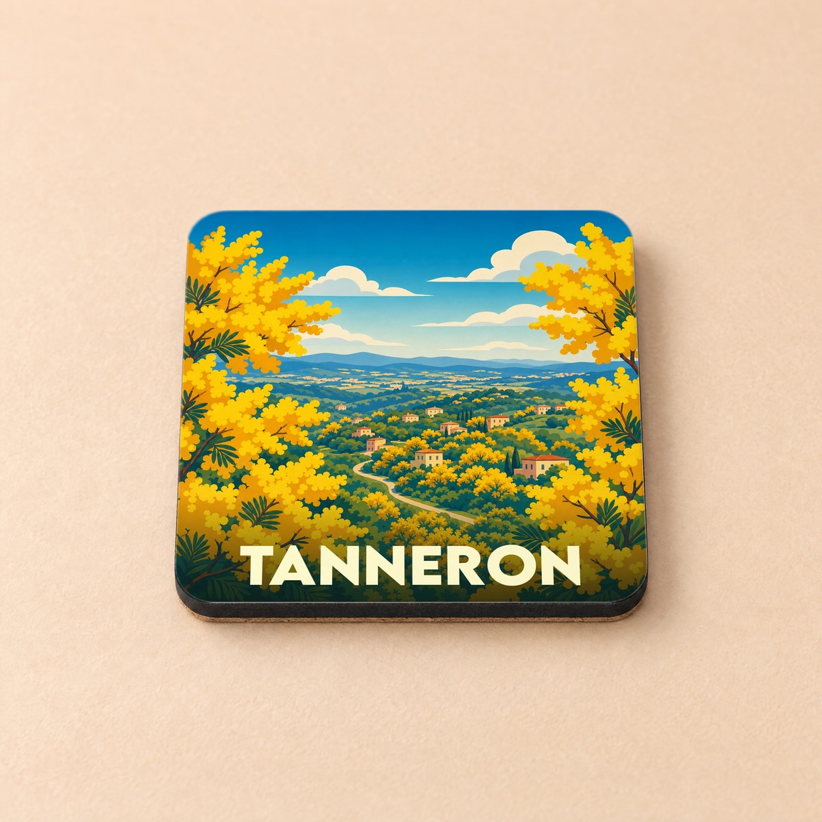 Dessous de verre souvenir de la ville de Tanneron avec une illustration stylisée de mimosas en fleurs.