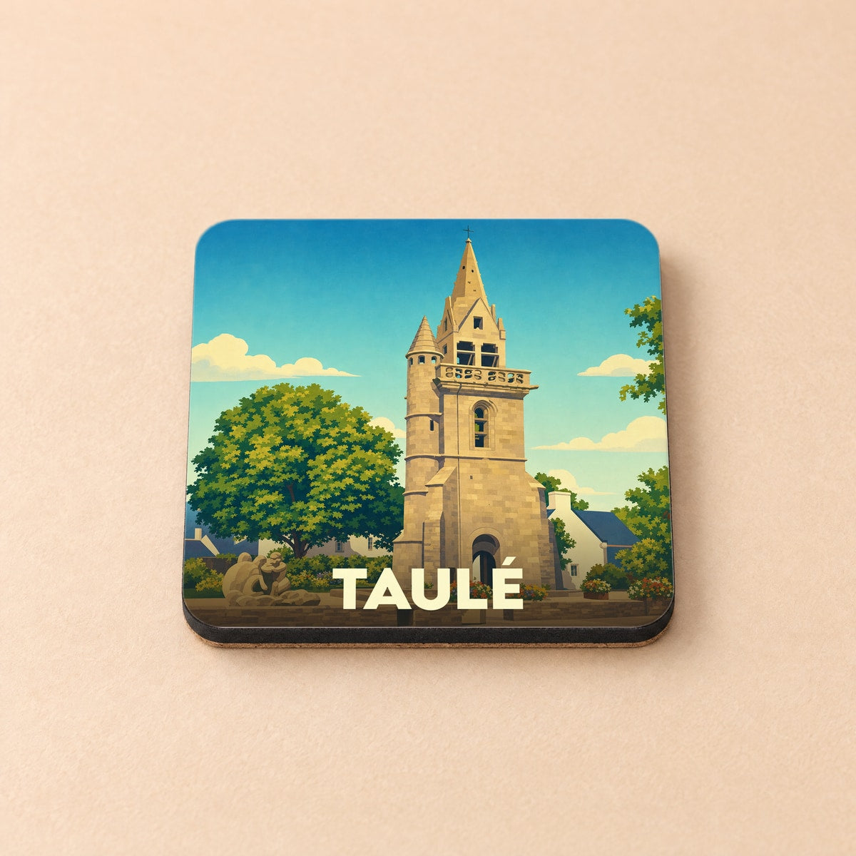 Dessous de verre souvenir de la ville de Taulé avec une illustration stylisée de son clocher.