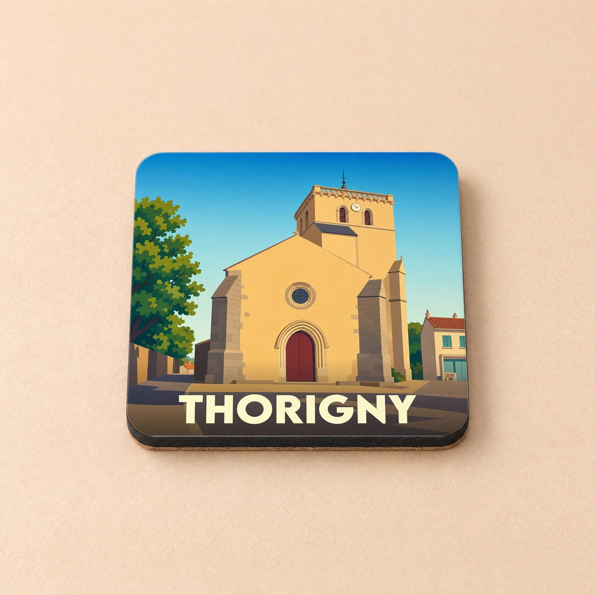 Dessous de verre souvenir de la ville de Thorigny avec une illustration stylisée de son église.