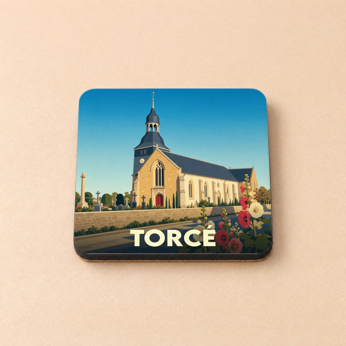 Dessous de verre souvenir de la ville de Torcé avec une illustration stylisée de son église.