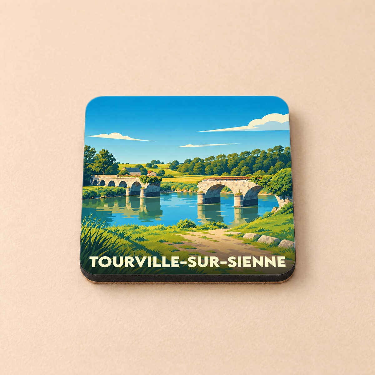 Dessous de verre souvenir de la ville de Tourville-sur-Sienne avec une illustration stylisée d'un pont de pierre.