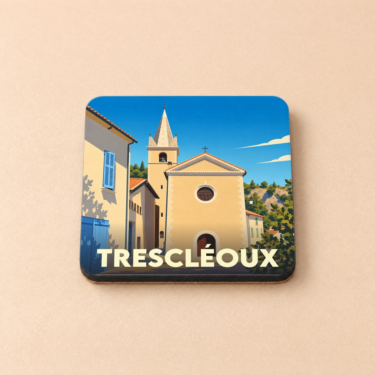 Dessous de verre souvenir de la ville de Trescléoux avec une illustration stylisée de son église.