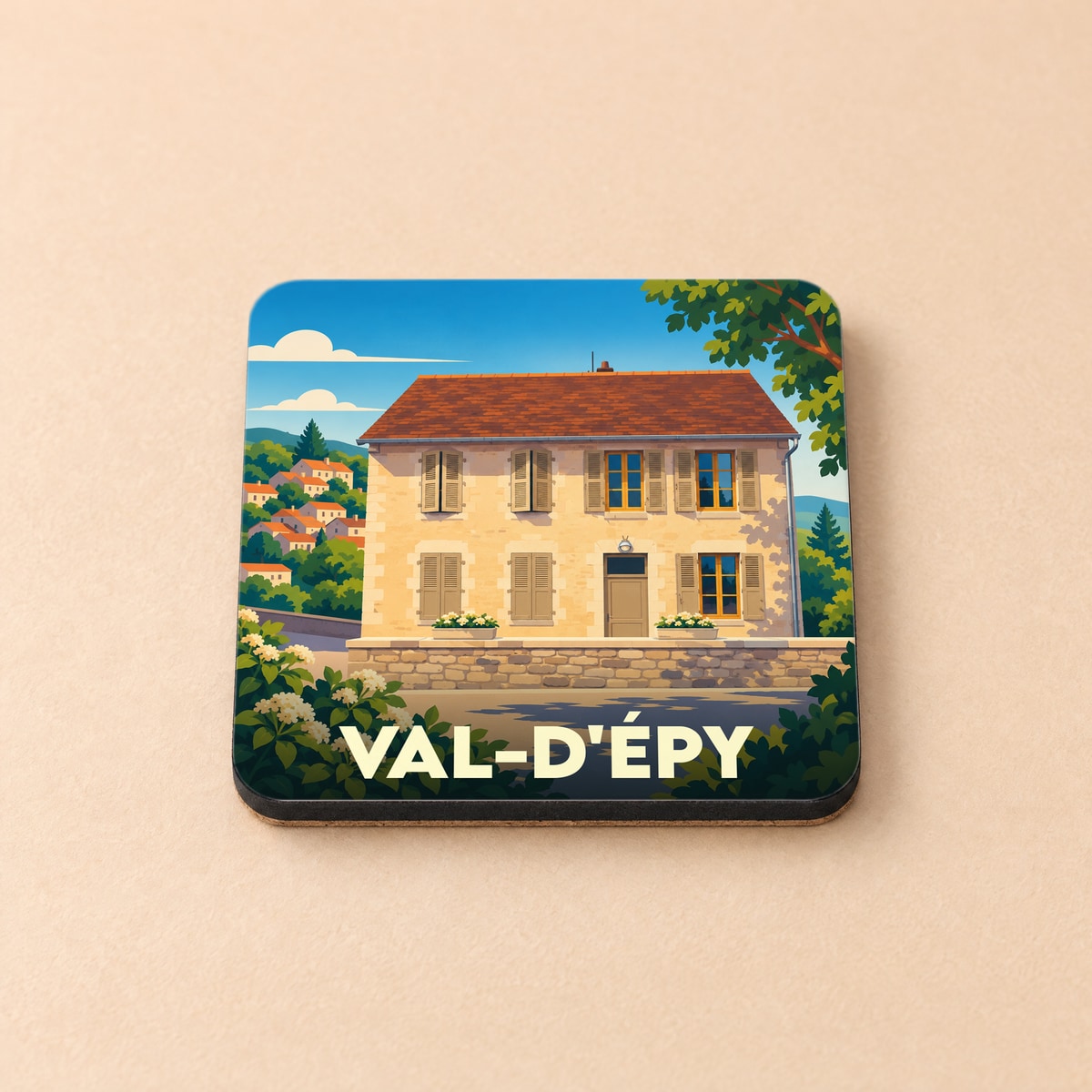 Dessous de verre souvenir de la ville de Val-d'Épy avec une illustration stylisée d'une maison traditionnelle.