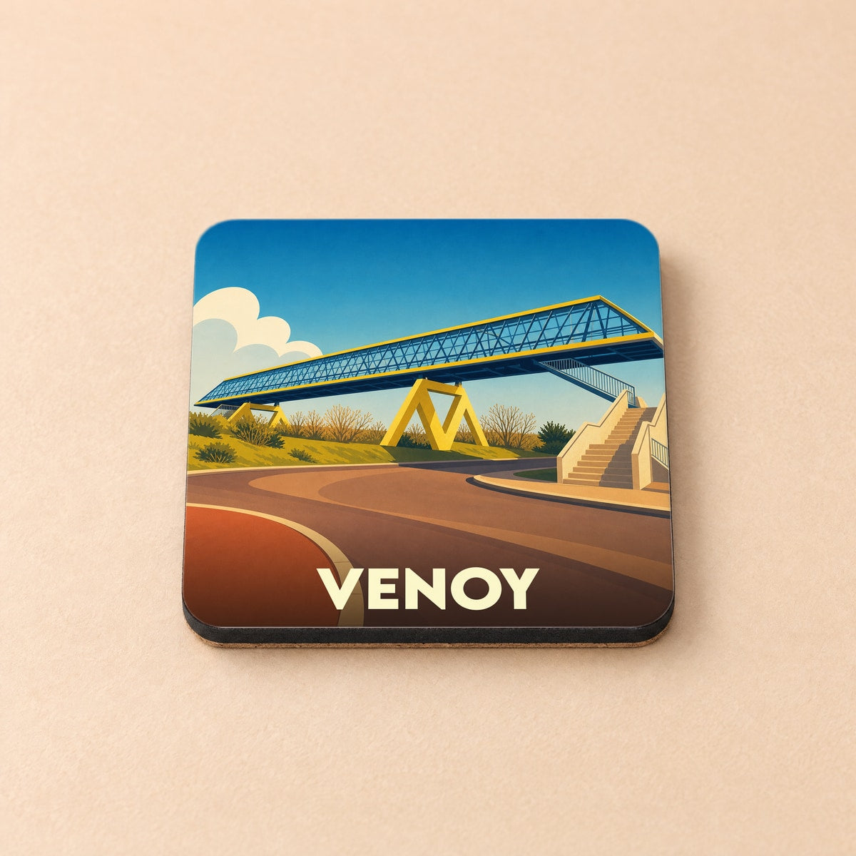Dessous de verre souvenir de la ville de Venoy avec une illustration stylisée d'une passerelle moderne.