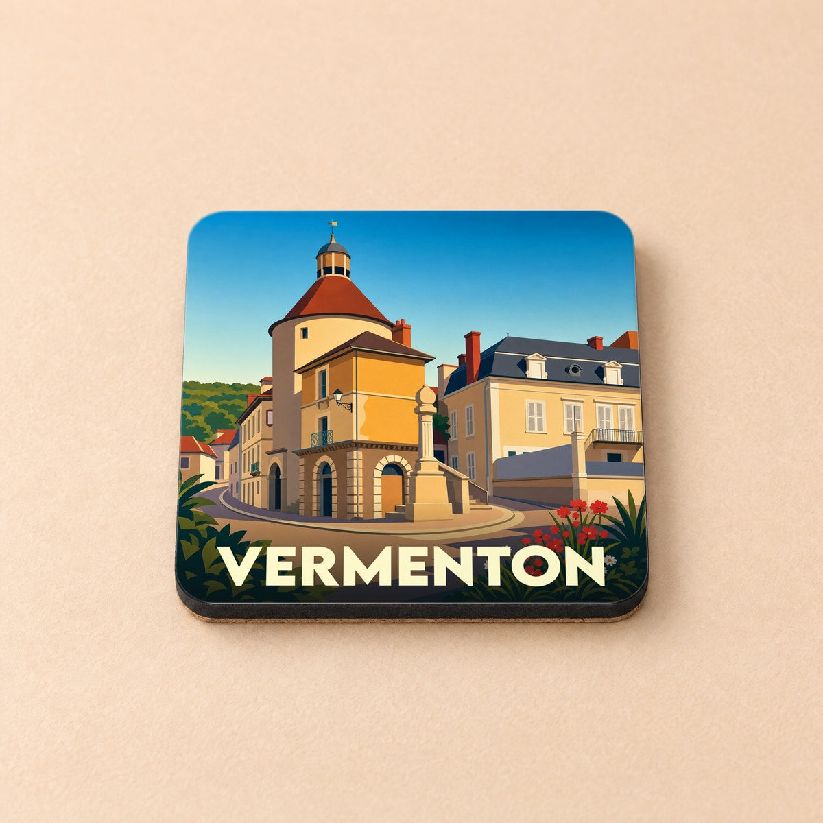 Dessous de verre souvenir de la ville de Vermenton avec une illustration stylisée de son architecture.