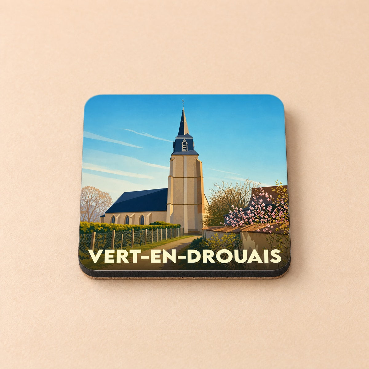 Dessous de verre souvenir de la ville de Vert-en-Drouais avec une illustration stylisée de son église.