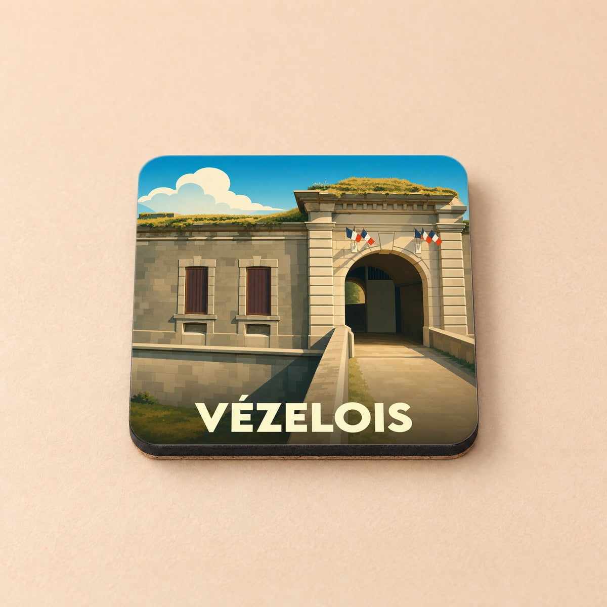 Dessous de verre souvenir de la ville de Vézelois avec une illustration stylisée de son fort.