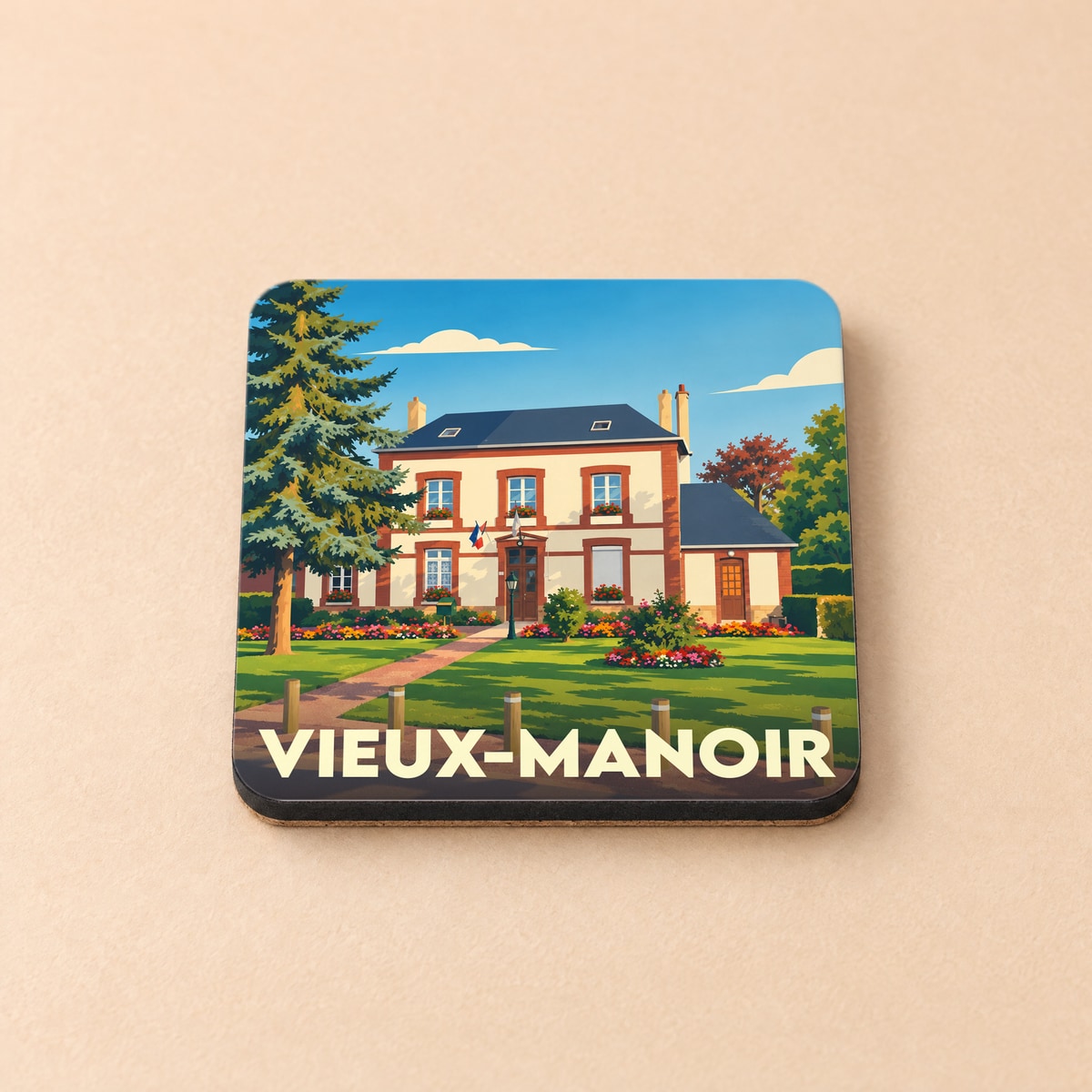 Dessous de verre souvenir de la ville de Vieux-Manoir avec une illustration stylisée d'un manoir normand.