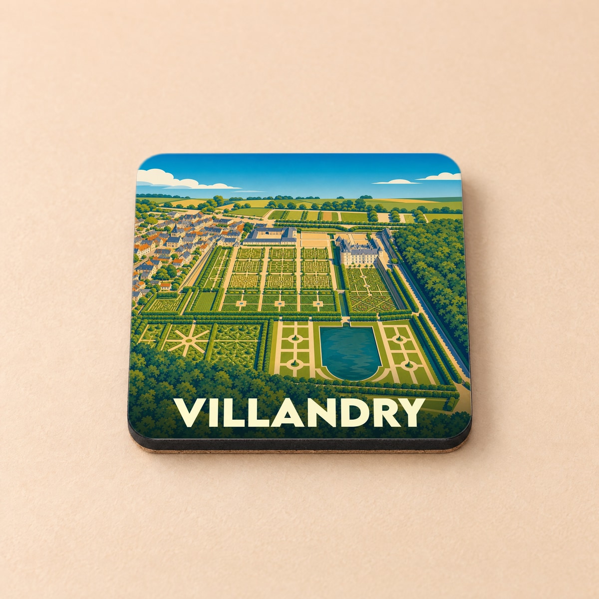 Dessous de verre souvenir de la ville de Villandry avec une illustration stylisée de son château et de ses jardins.