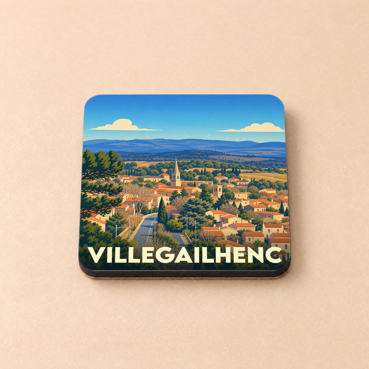 Dessous de verre souvenir de la ville de Villegailhenc avec une illustration stylisée.