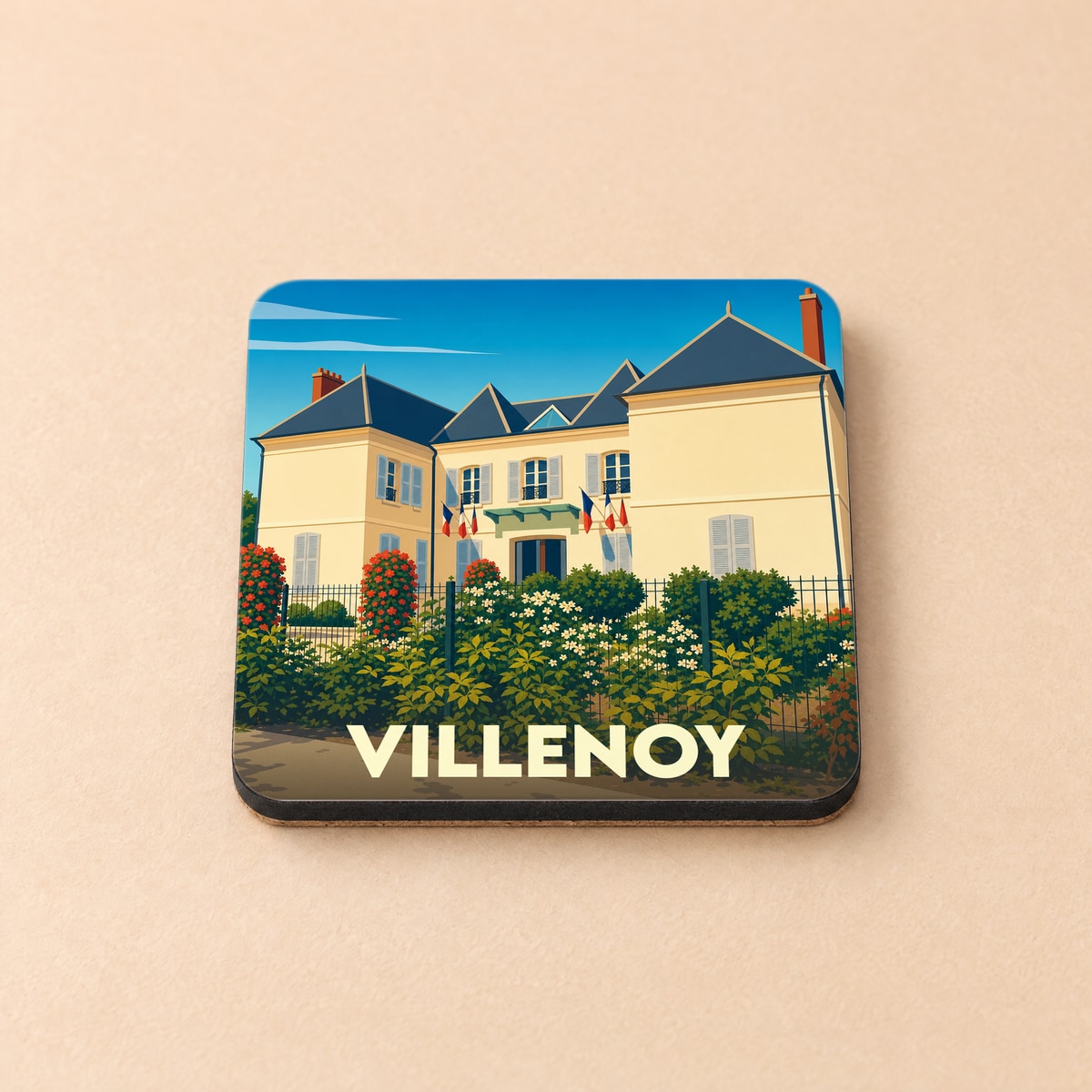 Dessous de verre souvenir de la ville de Villenoy avec une illustration stylisée de son hôtel de ville.