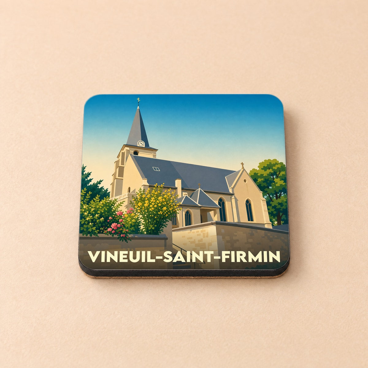 Dessous de verre souvenir de la ville de Vineuil-Saint-Firmin avec une illustration stylisée de son église.