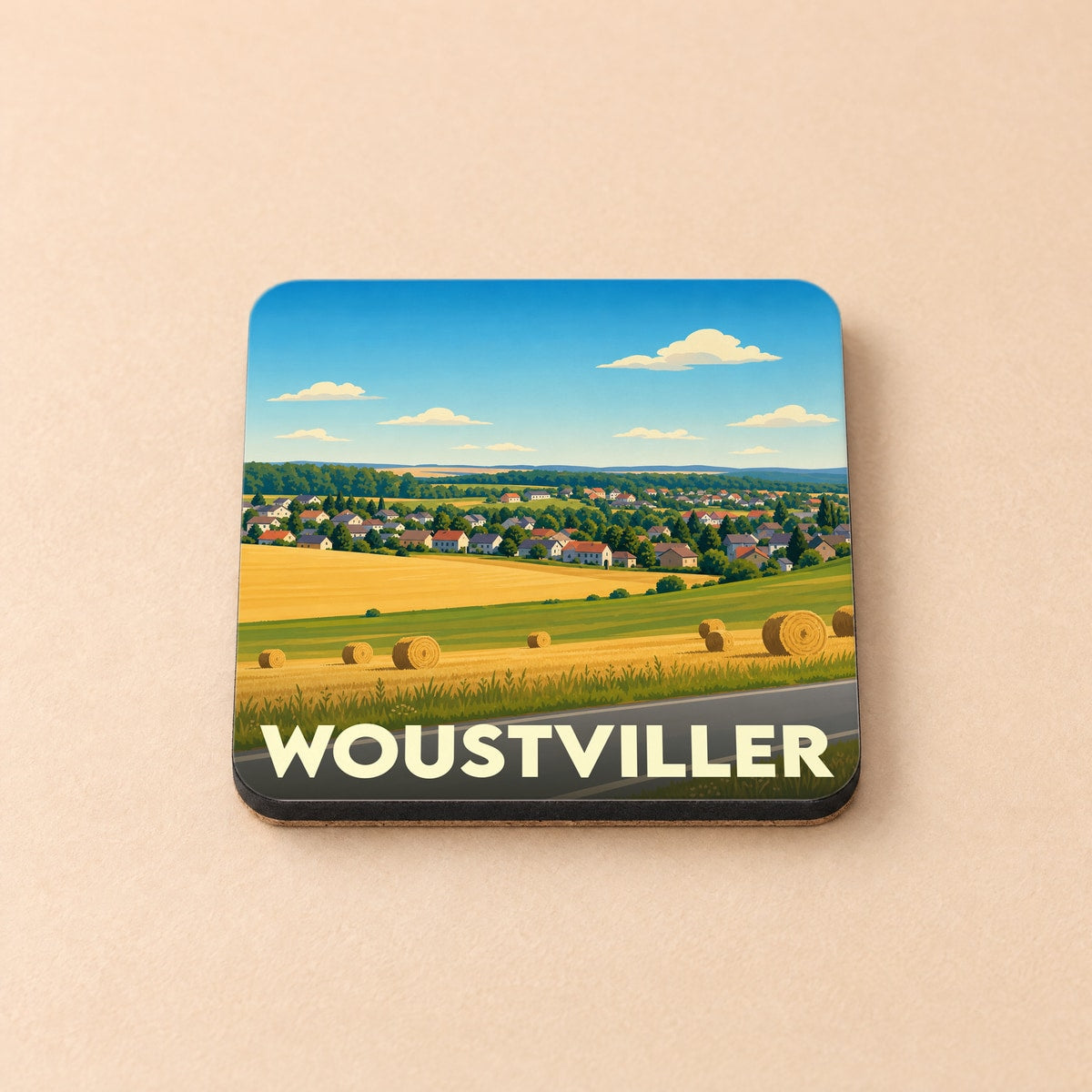 Dessous de verre souvenir de la ville de Woustviller avec une illustration stylisée d'un paysage rural.